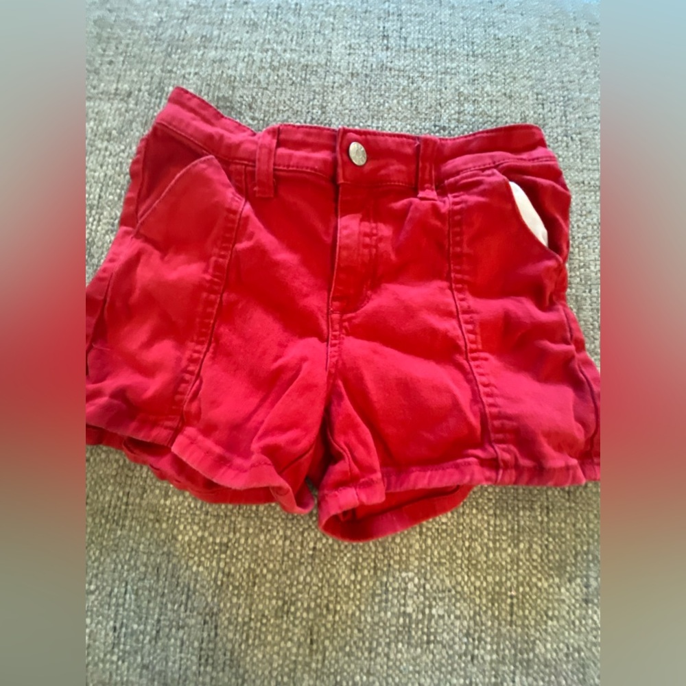 red shorts